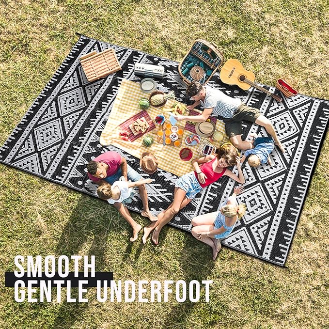 OLANLY Outdoor Rug Waterproof 4x6 ft, Reversible Outdoor Plastic Straw Rug, Boho Patio Rug, Indoor Outdoor Carpet, RV Mat Outside for Patio, Camp, Picnic, Balcony, Deck, Backyard, Black & White